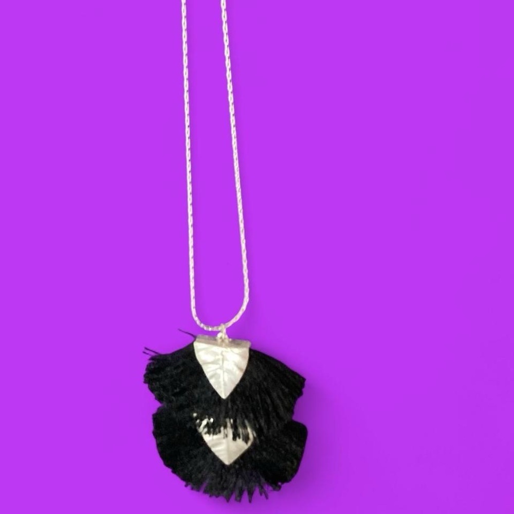 Silver tone and black tassel necklace leaf shaped